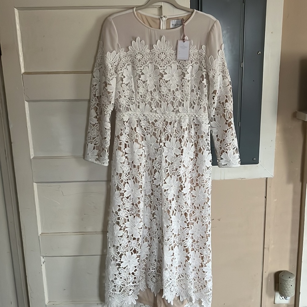 Dainty Jewel’s lace dress
